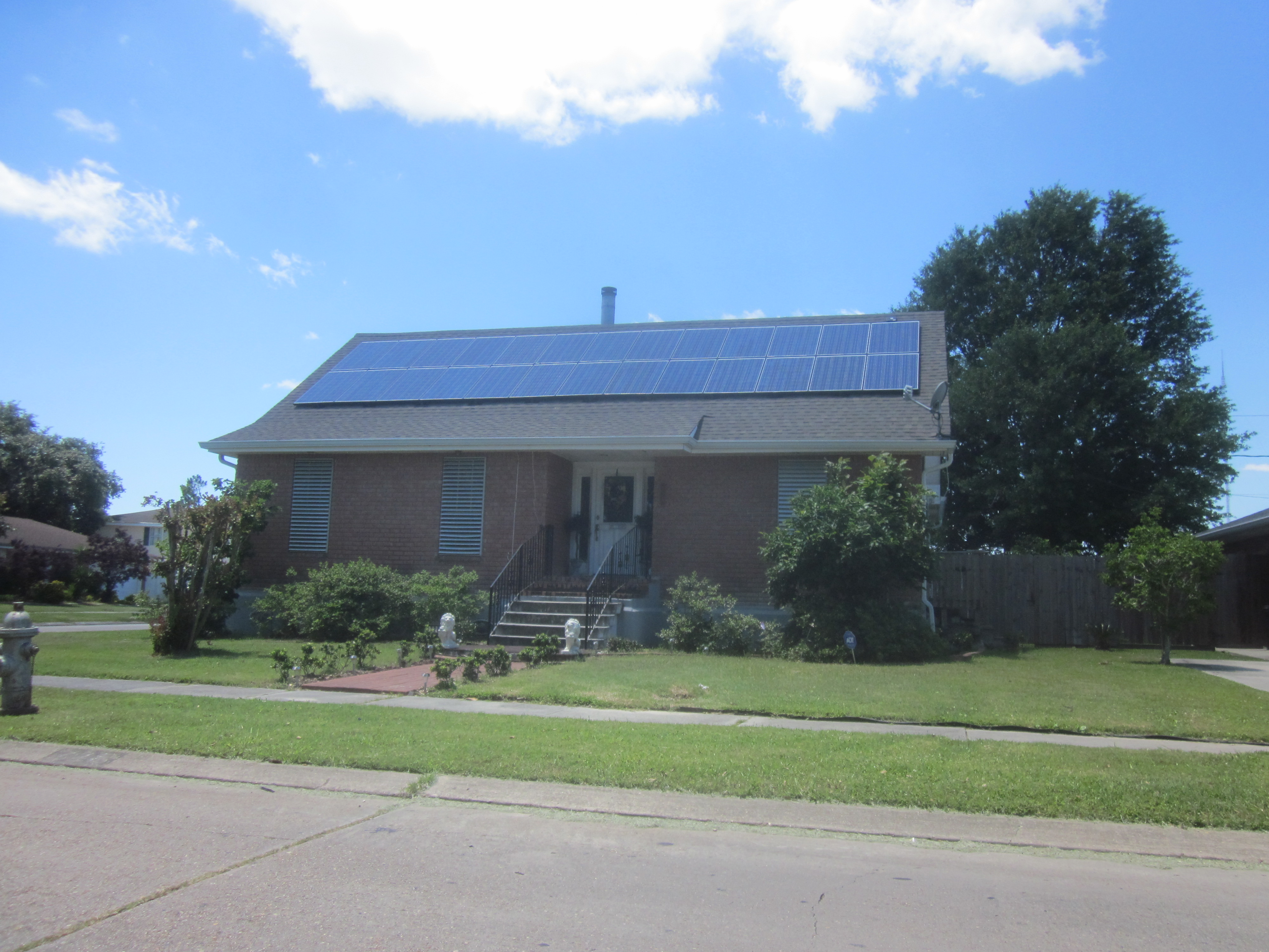Rooftop solar panel array installed on a building in the Sacramento Valley